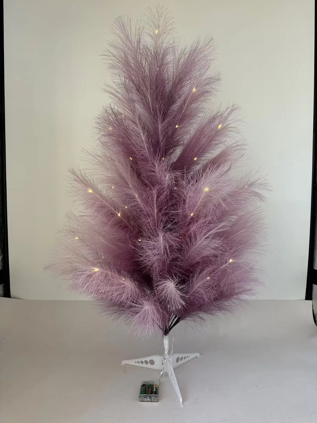 Purple pre-lit reed Christmas tree